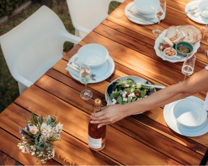 woman-setting-a-dining-table-for-housewarming-picture
